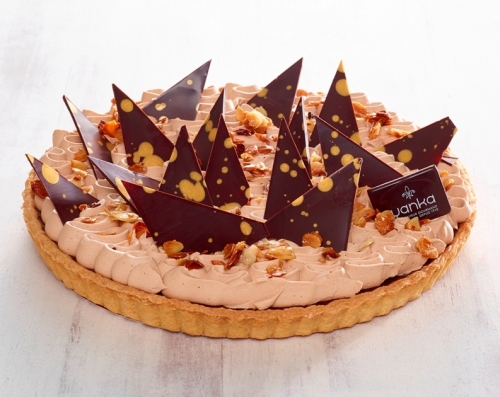 La tarte chocolat croustillant - Tarte garnie d’un croustillant praliné et d’une ganache montée chocolat au lait.